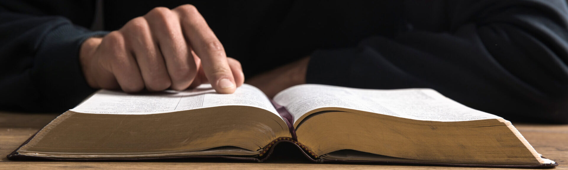 Man Reading The Bible